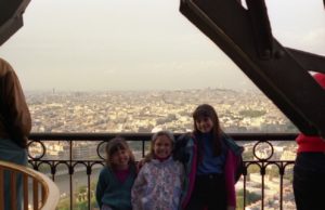MilKid - Sarah and her sister at the top of the Eiffel Tower is Paris, France